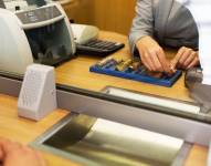 Imagen referencial de atención bancaria en agencia.